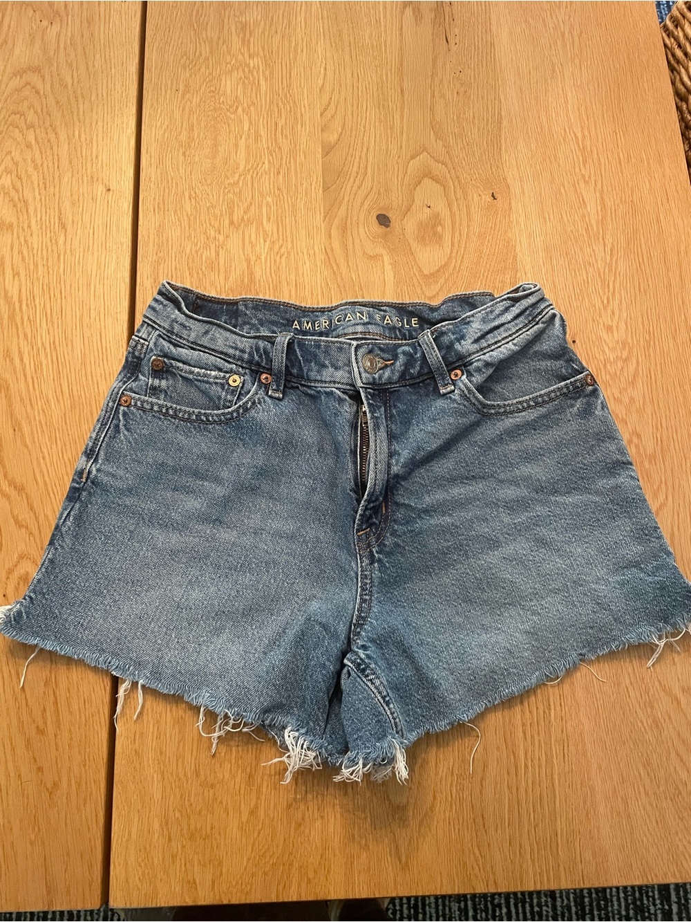 American Eagle Outfitters Light Blue High-Rise Frayed Denim Shorts